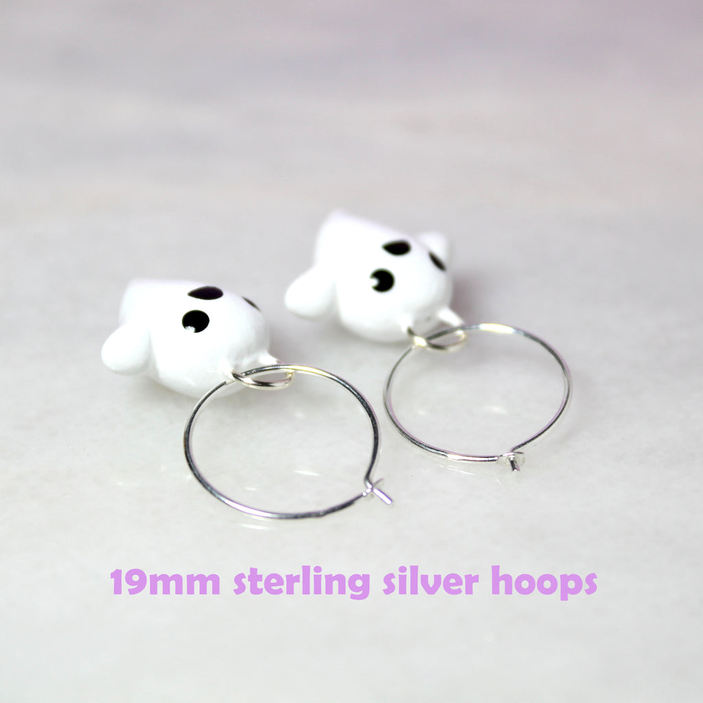 Top view of the ghost hoop earrings with text that reads: "19mm sterling silver hoops."